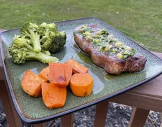Meat, carrots, and broccoli