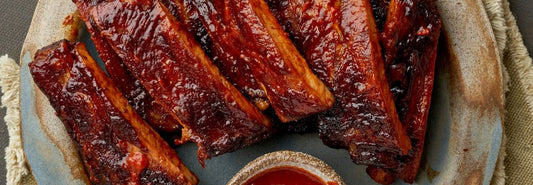 best meats to smoke - banner - pork ribs