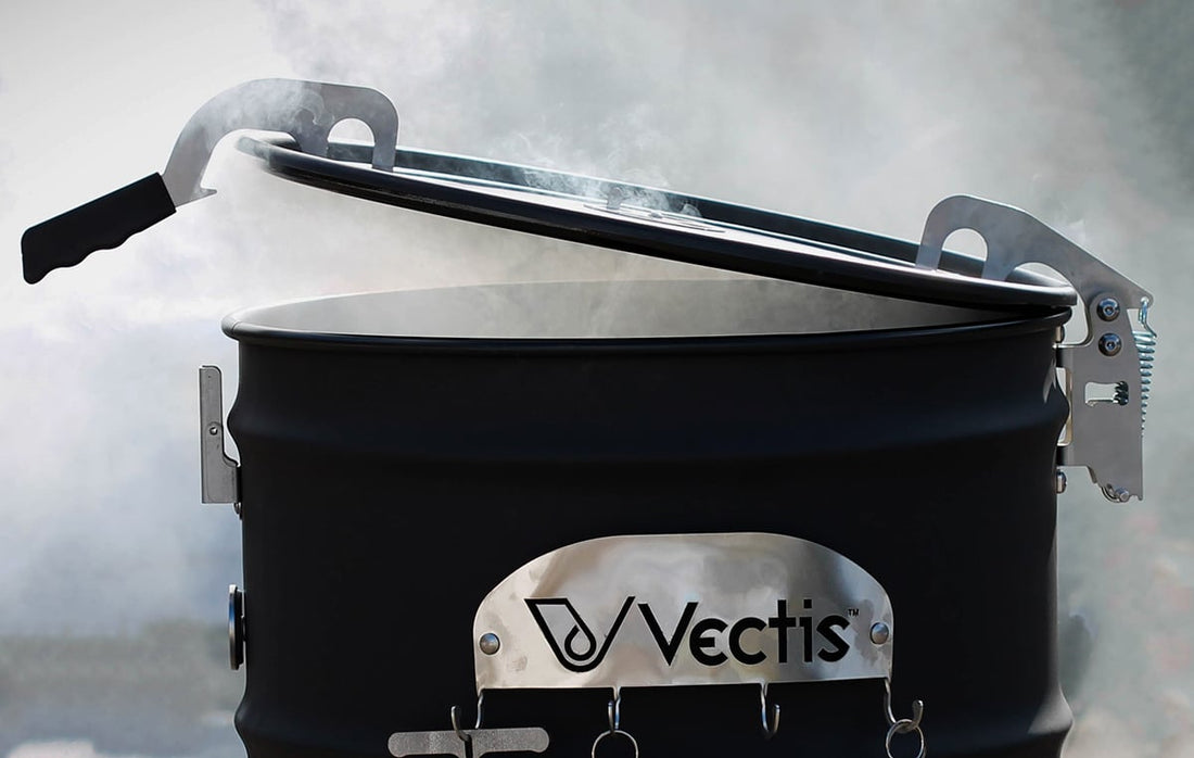 Smoker FAQ image showing a drum smoker with a Vectis hinge and latch releasing smoke during use.
